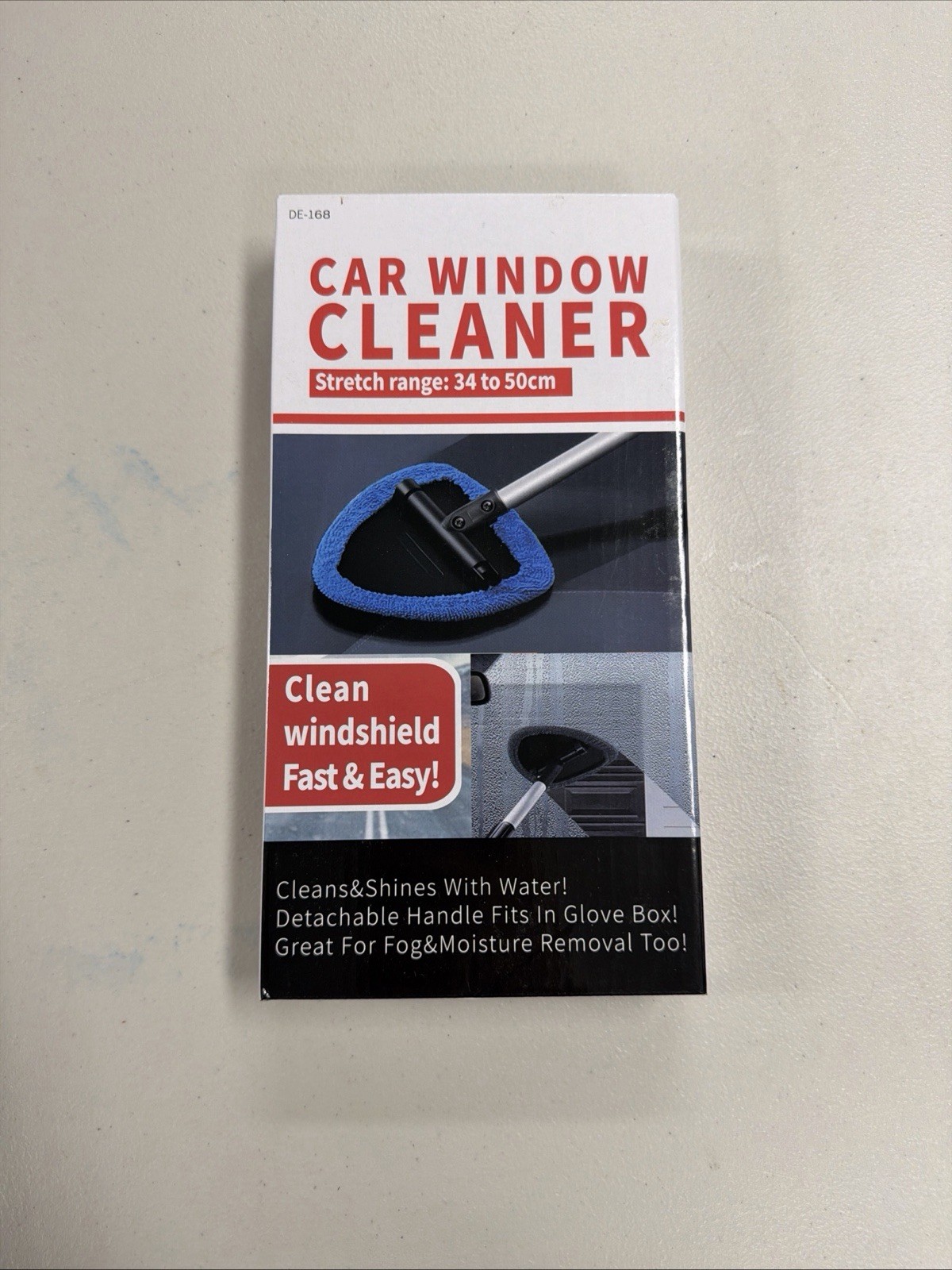 car window cleaner features a telescoping handle that extends